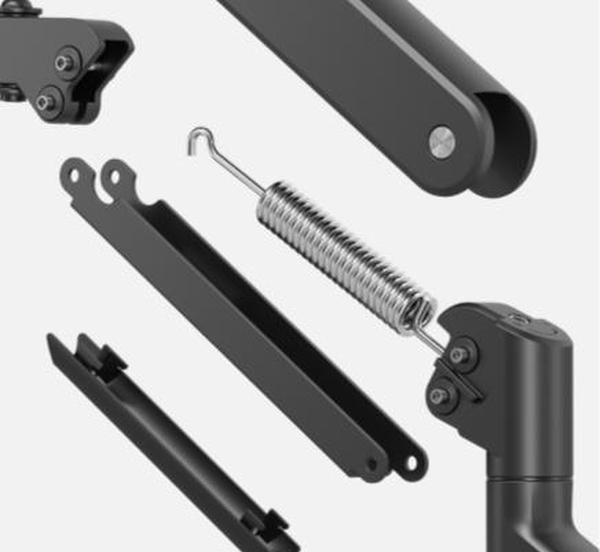 DM4210 – mechaniczny system sprężynowy w ramieniu